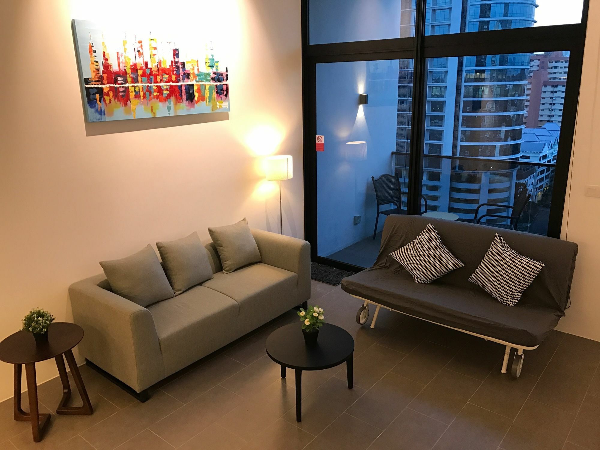 Hotel Alila Bangsar Kuala Lumpur Exterior foto A living room with a sofa bed