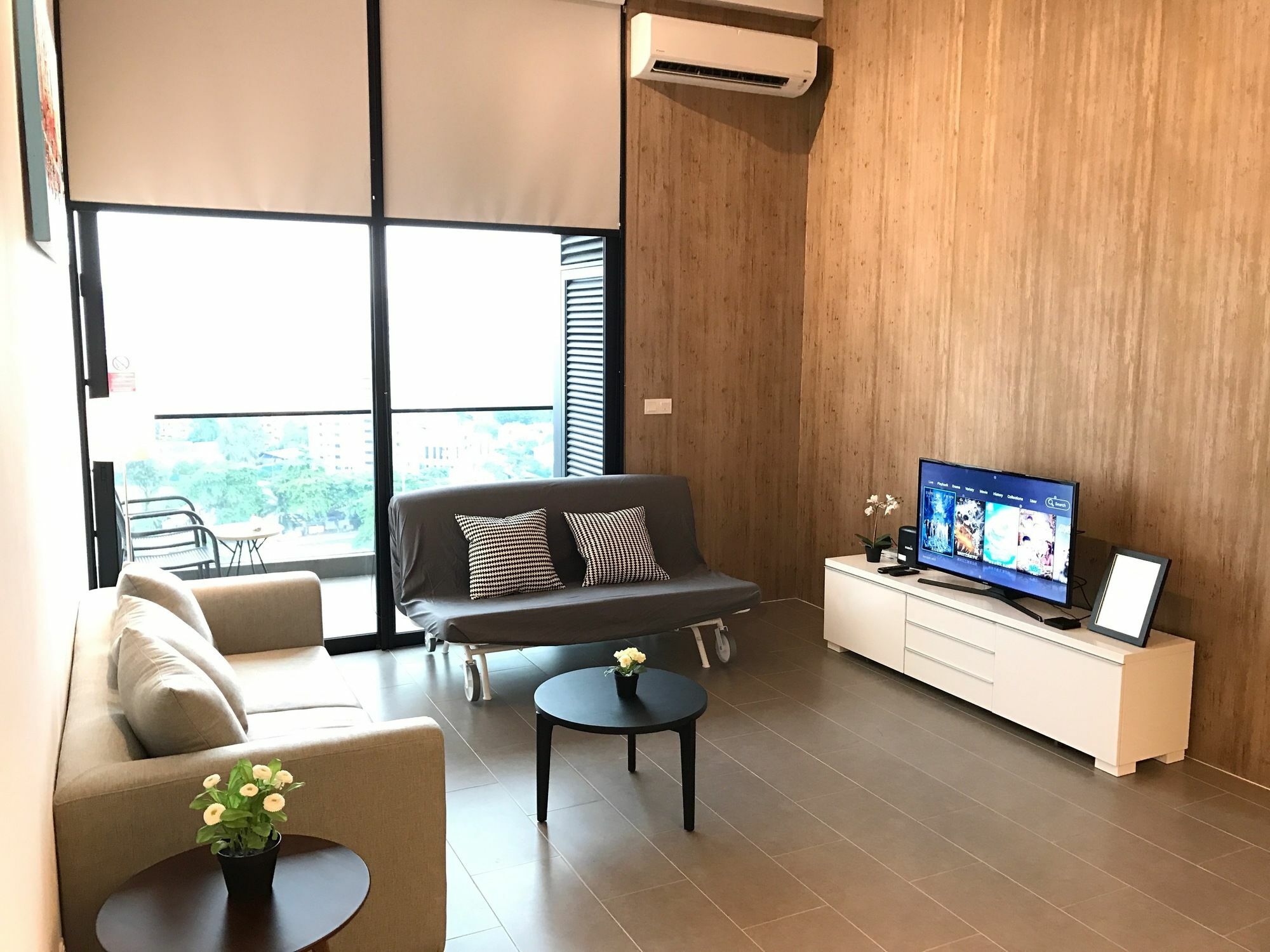 Hotel Alila Bangsar Kuala Lumpur Exterior foto A living room in a serviced apartment in Kuala Lumpur, Malaysia.